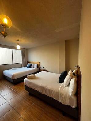 Kahden hengen perhehuone, 1 makuuhuone | Egyptinpuuvillaiset lakanat, ylelliset vuodevaatteet, untuvapeitot