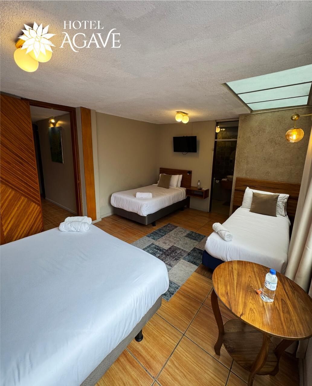 Neljän hengen perhehuone, 1 makuuhuone | Egyptinpuuvillaiset lakanat, ylelliset vuodevaatteet, untuvapeitot