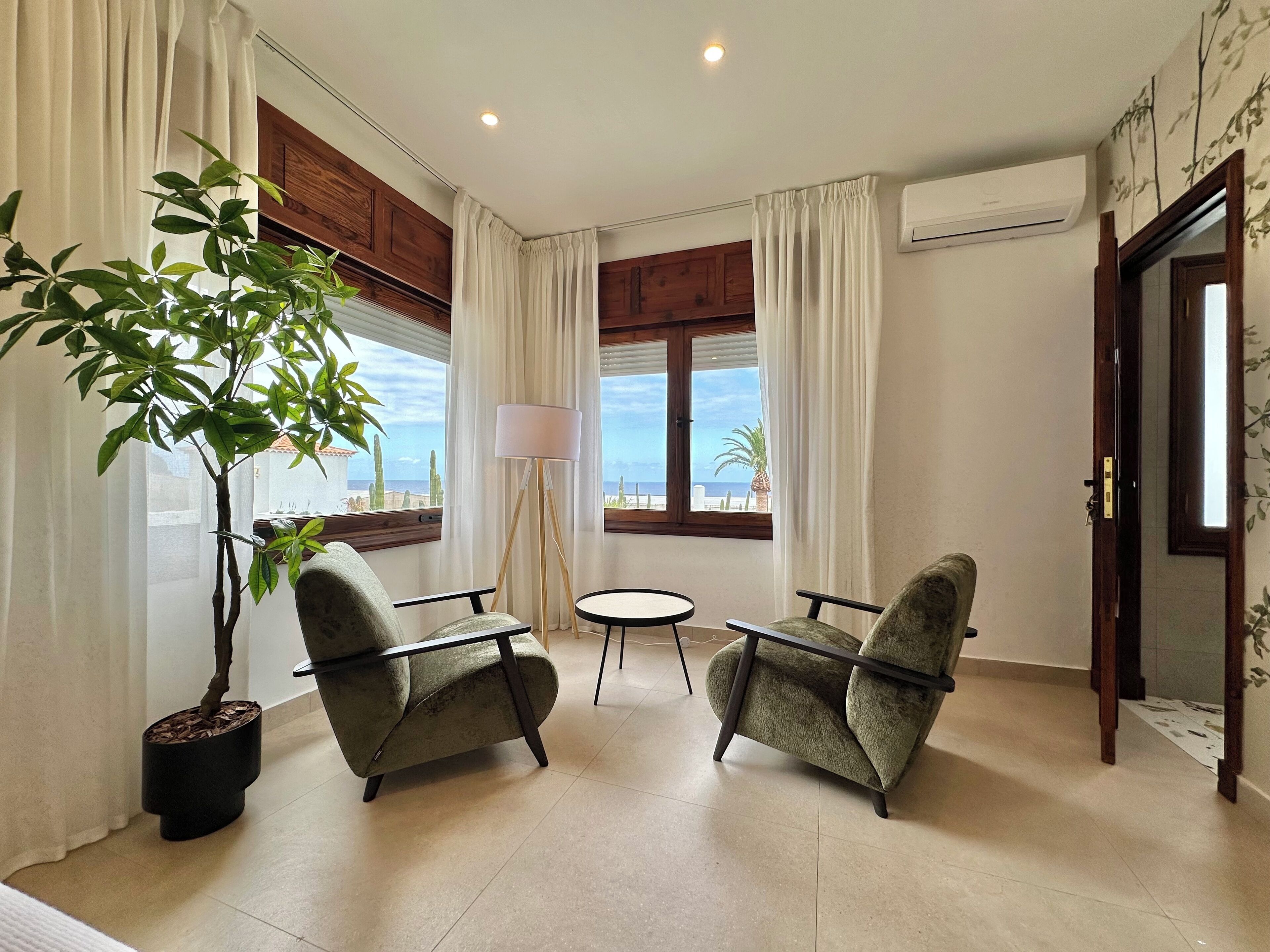 Deluxe Villa, 5 Bedrooms, Patio, Garden View | Living area | 70-inch Smart TV with cable channels