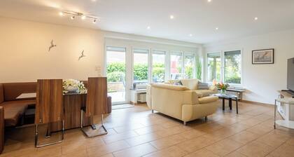 Robbenglück Tossens ground floor apartment (barrier-free, family-friendly, with garden)