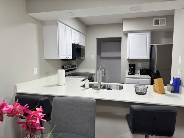Fridge, microwave, oven, stovetop