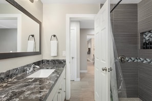Shower, towels, soap, toilet paper