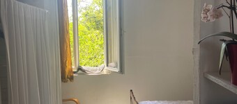 Quiet studio overlooking the garden. Pets at no extra charge