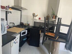 Fridge, microwave, stovetop, coffee/tea maker