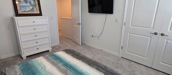 Brand new, beautiful 2-bedroom townhome in Sarasota with WiFi, AC, & two pools.
