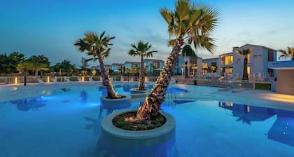 Vacation apartment by the sea in a vacation complex with pool area and private whirlpool