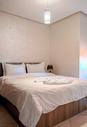 1 chambre, fer et planche à repasser, Wi-Fi, draps fournis