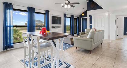 Relax poolside with the whole family or hunt shells on the beach.