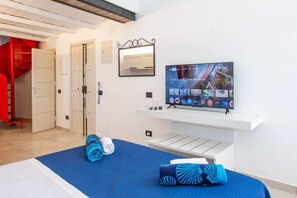 2 habitaciones, tabla de planchar con plancha y ropa de cama 