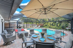 Outdoor dining - New Listing! Paradise in the Sun - Heated Saltwater Pool/Spa, 1 Mile to Beach! (Naples)