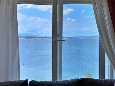 Holiday apartment with sea view and outdoor pool