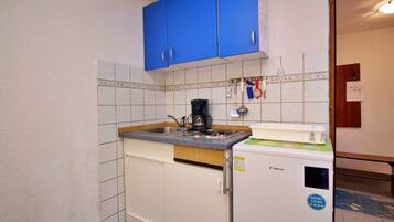 Fridge, stovetop, coffee/tea maker, cookware/dishes/utensils