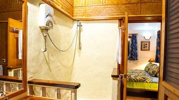 Family Room, Balcony | Bathroom | Shower, towels, toilet paper