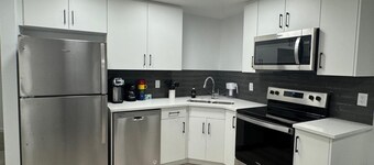 New Cozy 2 BR suite w/ king bed