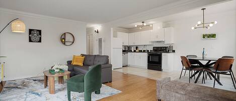 Family Apartment, 2 Bedrooms, Kitchen, Mountain View | Living area | 55-inch LED TV with digital channels
