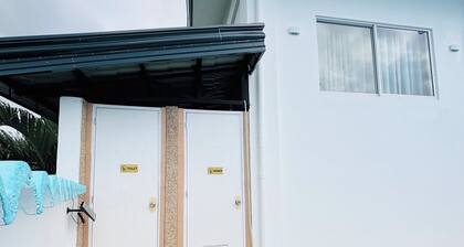 A luxury Apartment features 2 Queen beds,AC’s,shared pool,outdoor kitchen,etc.