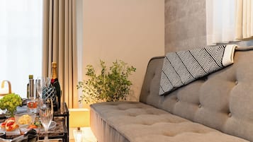 Deluxe Apartment, City View | Living area | 40-inch Smart TV with digital channels