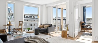 Seaside Promenade Strolls from a 2 Bedroom Downtown Home