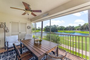 Outdoor dining - Golf Shores 4BR Retreat w/ Pool, Golf Cart & Patio (Destin)