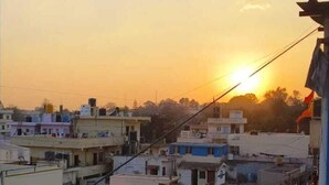 A cityscape at sunset with buildings and a clear sky. - Bms Luxury homes (Anekal)