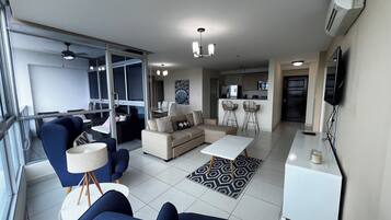 Deluxe Apartment, Balcony, Beach View | Living area