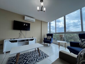 Deluxe Apartment, Balcony, Beach View | Living area - Oceanfront in Coronado Bay (Las Lajas)