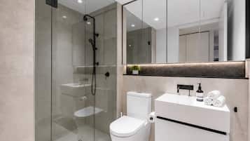 Shower, hair dryer, towels, soap