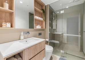Shower, hair dryer, towels