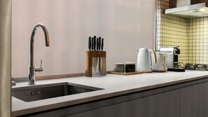 Coffee/tea maker, fridge, microwave, oven