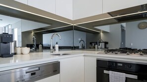 Coffee/tea maker, fridge, microwave, oven
