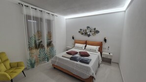 2 habitaciones, tabla de planchar con plancha, wifi y ropa de cama 
