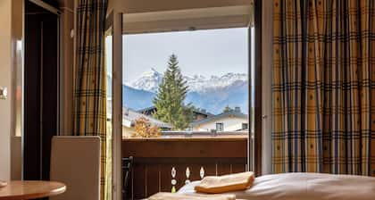 Alpenurlaub pur – Großzügiges Ferienhaus mit 5 Schlafzimmern & Sommerkarte