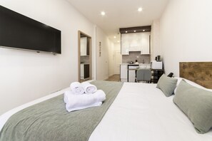 Fer et planche à repasser, Wi-Fi gratuit, draps fournis