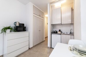 Fridge, microwave, coffee/tea maker, electric kettle