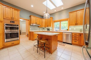 Fridge, microwave, oven, stovetop - Private lakefront home with dock, forest views, balconies, game room, and cozy indoor charm (Dublin)