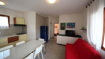 Apartment, 2 Bedrooms, Balcony, Garden View | Living room