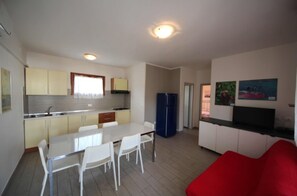 Apartment, 2 Bedrooms, Balcony, Garden View | Dining room - Charming Apartment With AC, Garden and Parking (Rosolina)