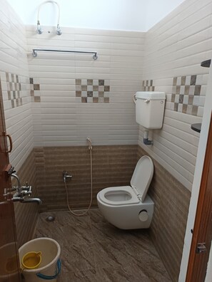 Dusj, håndklær og såpe