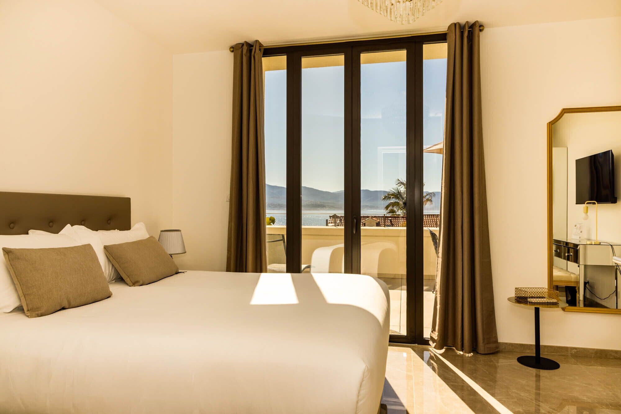 Deluxe Double Room, Sea View | Premium bedding, pillow-top beds, minibar, in-room safe