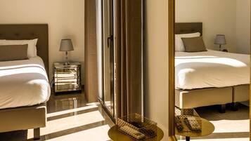 Premium bedding, pillowtop beds, minibar, in-room safe