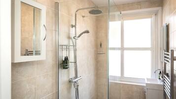 Shower, hair dryer, towels, soap