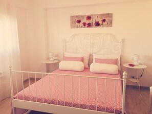 2 dormitorios, tabla de planchar con plancha, wifi gratis y ropa de cama