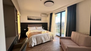 In-room safe, desk, laptop workspace, soundproofing - KIMMIY HOTEL (Belgrade)