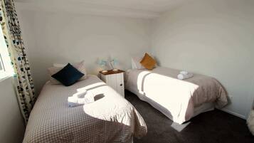 3 habitaciones y ropa de cama
