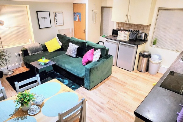 Living room with open plan kitchen