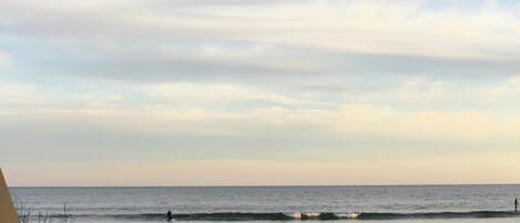 On the beach, sun-loungers