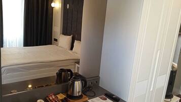 Premium bedding, down duvets, memory-foam beds, free minibar