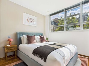 2 bedrooms, desk, iron/ironing board, travel crib