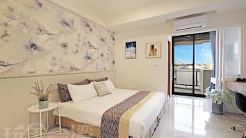 Deluxe Double Room, 1 Queen Bed, Balcony, Partial Ocean View | Desk, laptop workspace, free WiFi