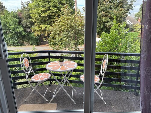 At a serene location opposite to the house of a double Nobel laureate